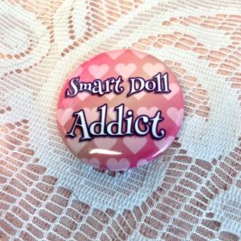 Smart Doll Addict 1.5” Pinback Button